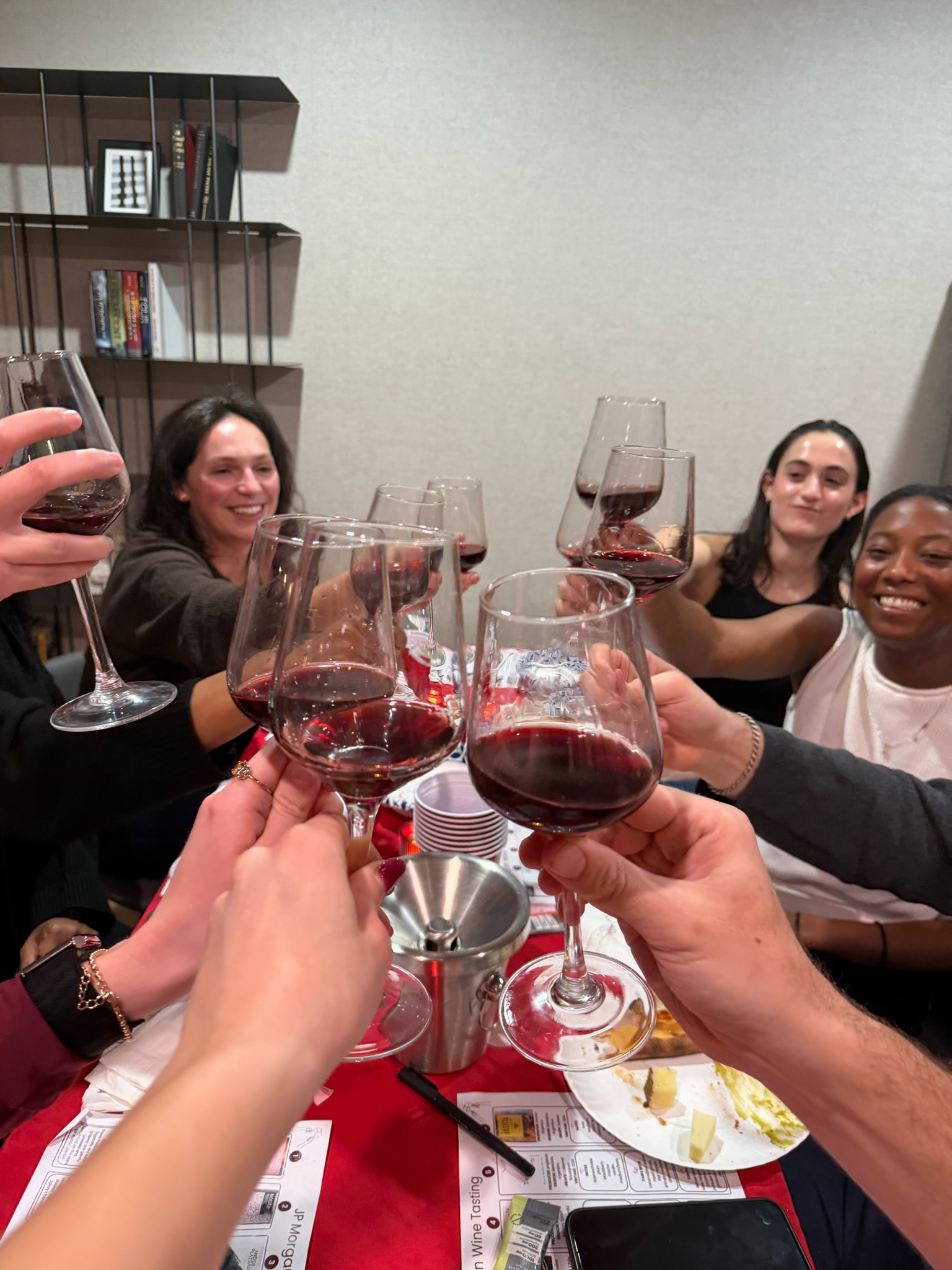 Bottles and glasses set out for an Intro to Wine tasting