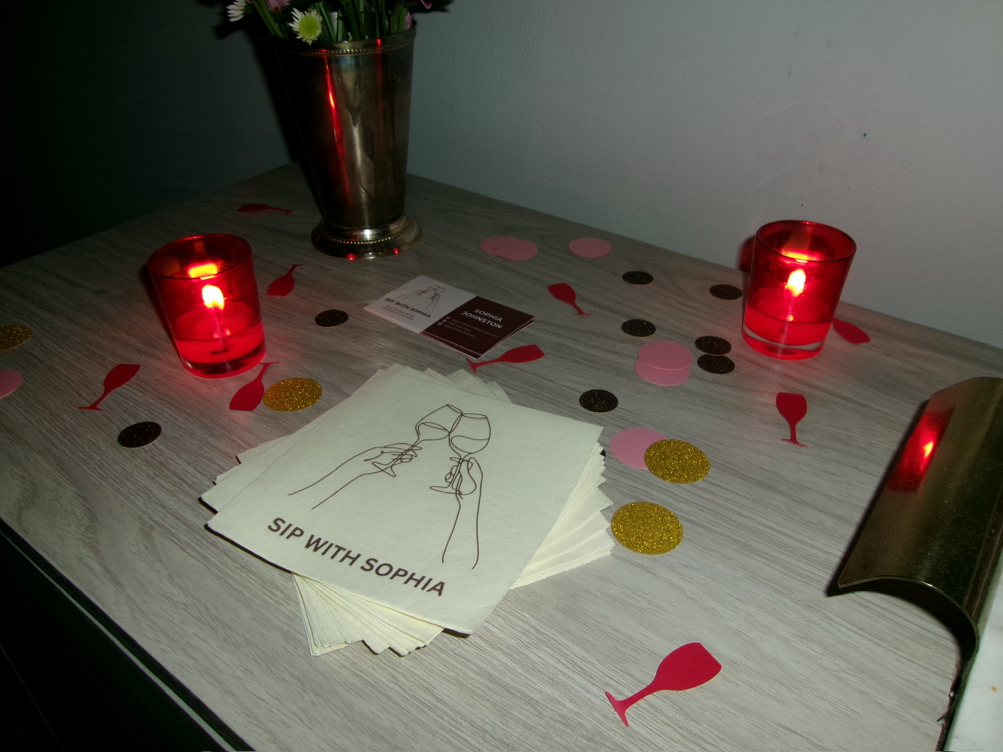 Napkins and candles laid out for a Sips tasting